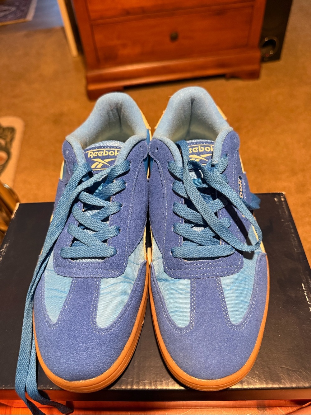 Reebok women’s Blue Suede & Textile Sneakers